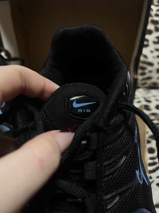 Nike Air Max Plus in the black and University Blue colorway.