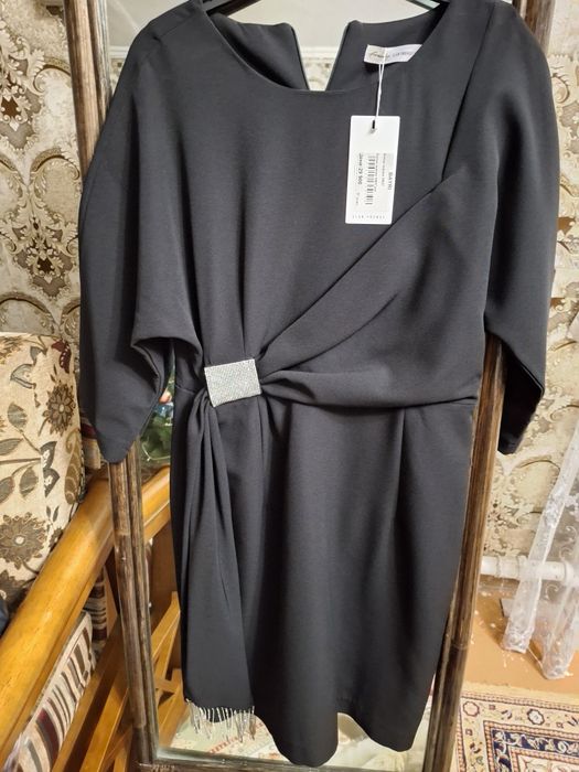 Продам совершенно новое платье