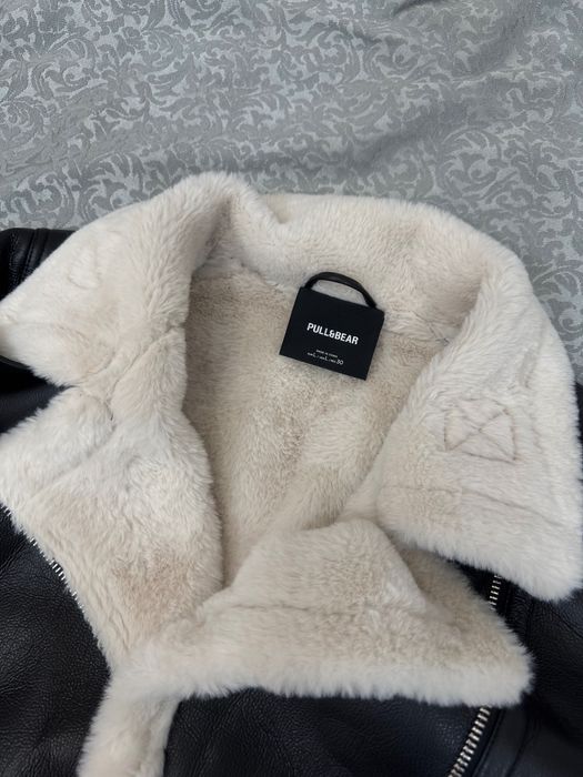 Черная дубленка с мехом