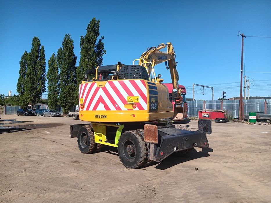 Vând sau schimb excavator komatsu PW 148