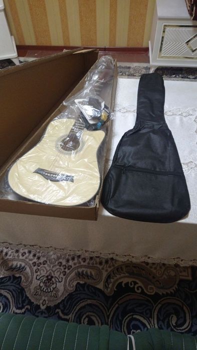 Gitara yengi olib lekin ishlatmaganman