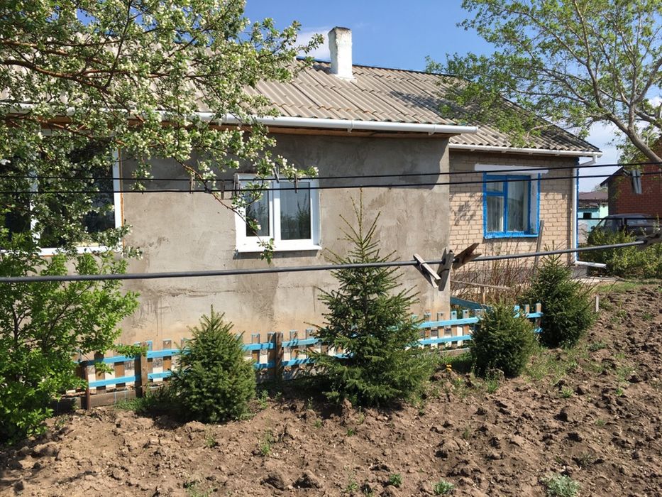 Дом с земельным участком