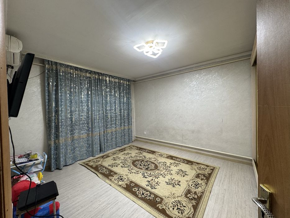 Угловой дом Алатау