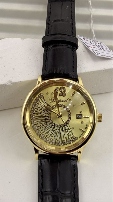 Женские часы золотые 750проба.