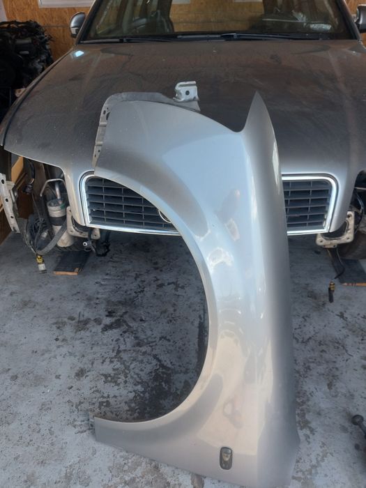 Aripa stanga fata AUDI A4 B6 model 2001 - 2005 cod culoare LY7Q