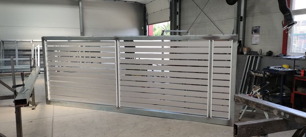 Делови 87 ЕООД метални врати, метални огради и метални колчета за огра