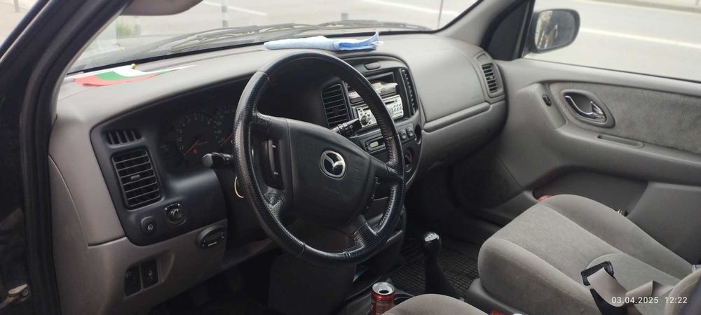 Мазда Трибют 2.0