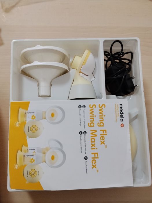Електрическа помпа Medela swing flex + ръчна помпа Medela