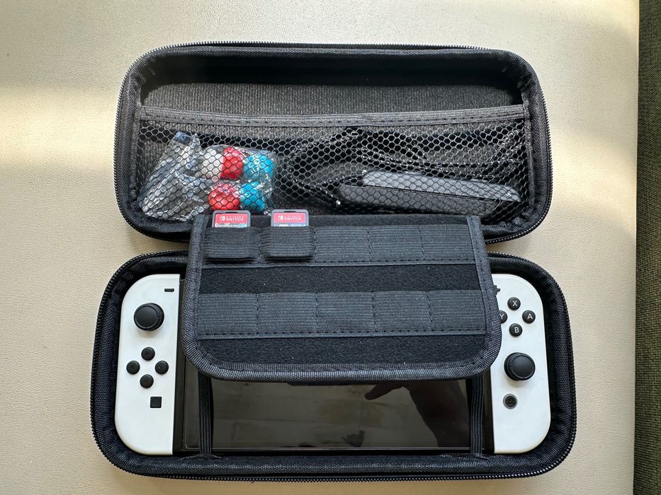 Nintendo Switch OLED alb – pachet complet + jocuri originale