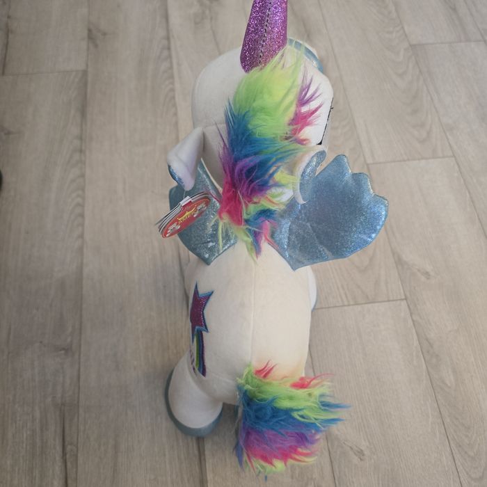 Плюшена играчка еднорог. Нова. 45 см висока.