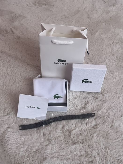 гривна Lacoste