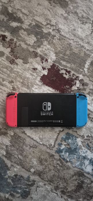 Consolă Nintendo Switch Neon Red/Blue + Dock + 2 Jocuri Fizice