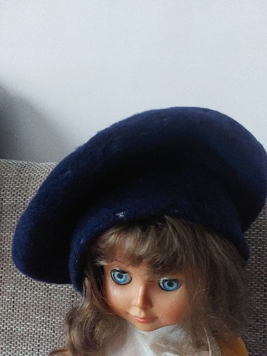 Bereta calduroasa de lana cu captuseala plusata