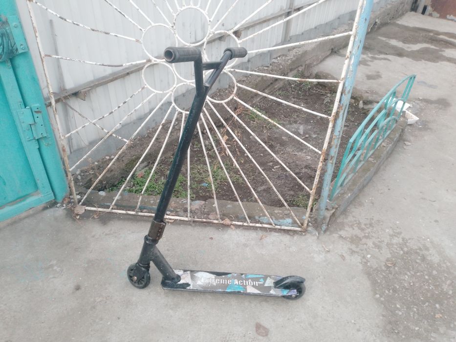 Продам трюковой самокат б/у