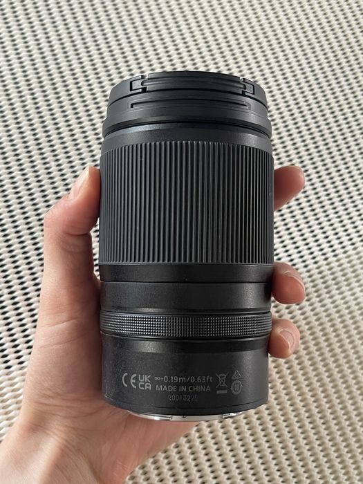 Обектив Nikkor 28-75 mm f/2.8 неразличим от нов