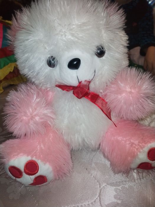 Мягкая игрушка белого цвета