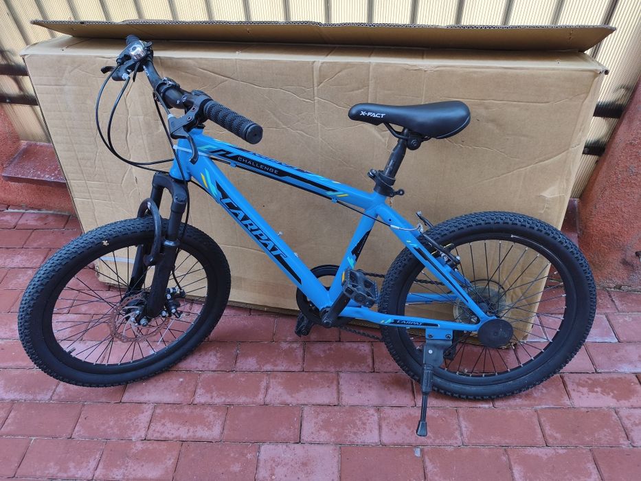 Bicicletă copii Carpat Challenger ,7 viteze Shimano Revoshiff,frâne disc, amortizor fata, cauciucuri noi,stare foarte buna calitate