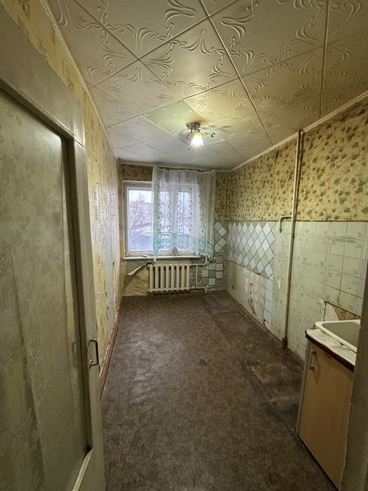 Продам 4 комнатную квартиру