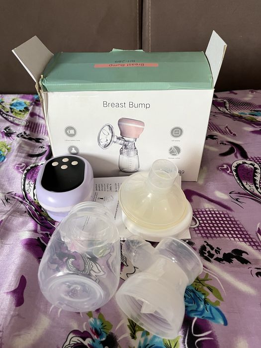 Продам Электрический молокоотсос Breast Pump