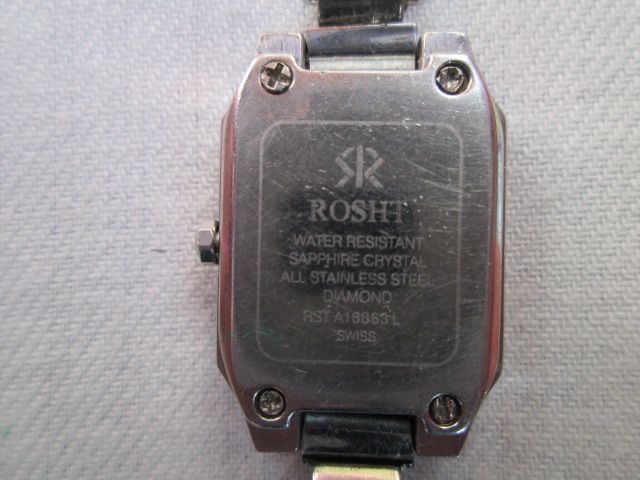 ROSHT швейцарски дамски часовник с 4 диаманта на циферблата.