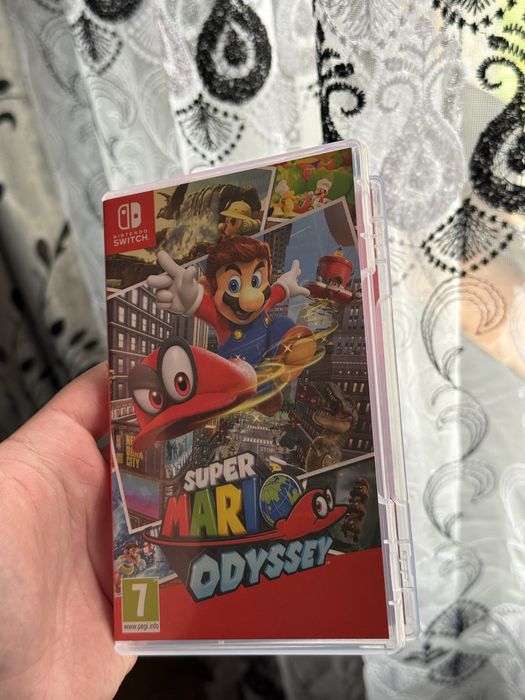 Nintendo Switch OLED + Mario Odyssey