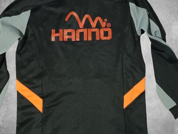 De vânzare Geacă sport XIOM x HANNO, negru cu portocaliu, unisex.