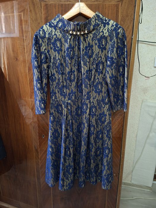 Костюм новый турецкий.  Размер 40. А также платья на 46 размер