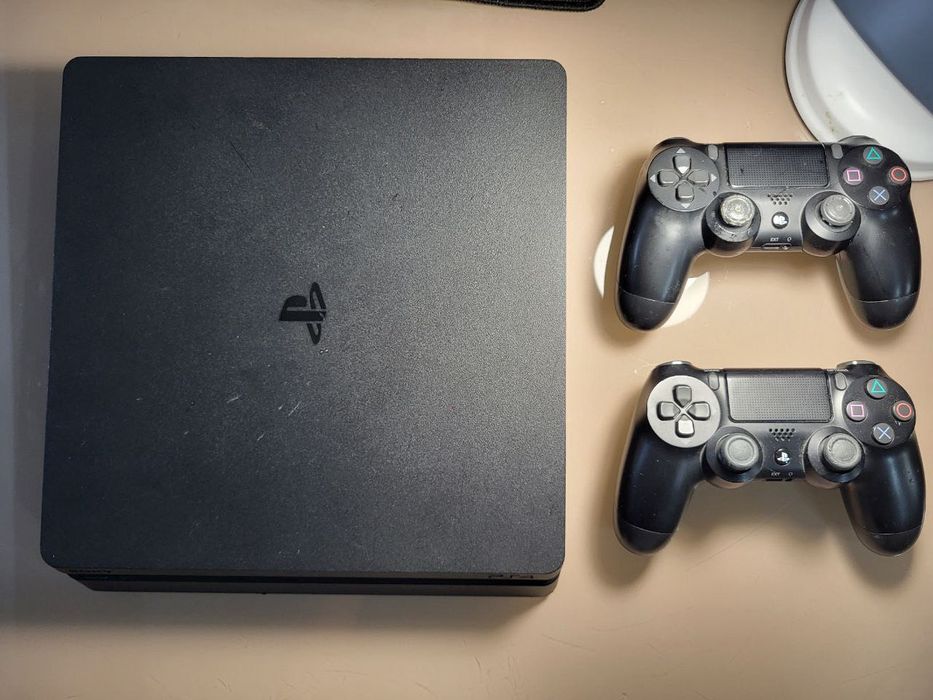 ps 4 slim + games