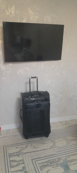 Чемодан с колёсиком