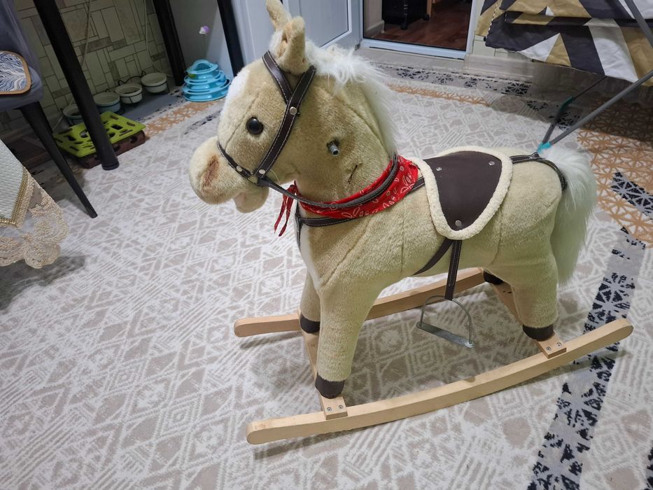 Продам детскую игрушку качалку