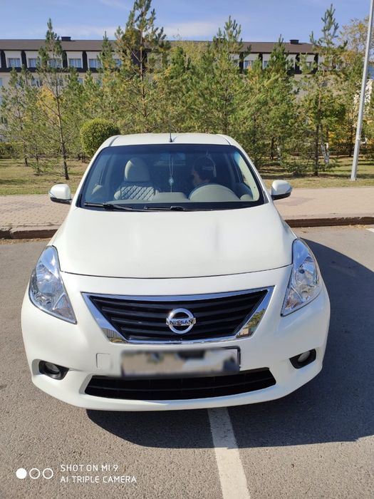 Nissan sunny 2012 года