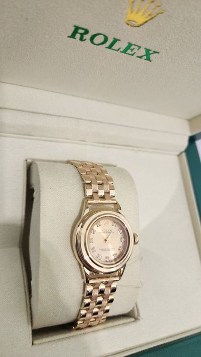 Женские золотые часы Rolex