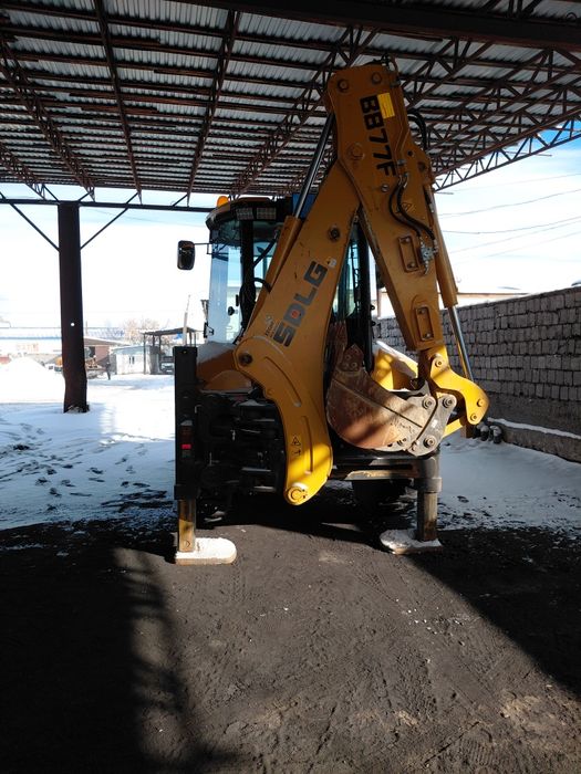 Эсковатор погрузчик