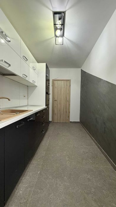 Garsoniera moderna de vanzare Dobroesti, finisata, bucatarie utilata