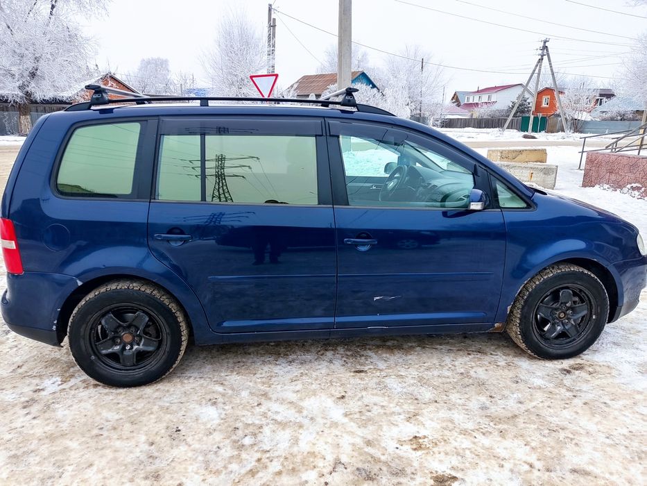 Фольксваген тауран