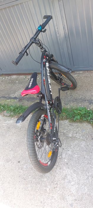 Vând bicicleta copii 9-12 ani