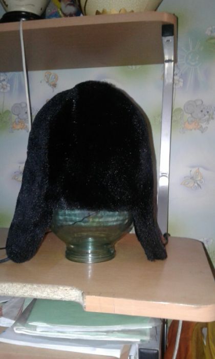 Стильная женская шапка ушанка