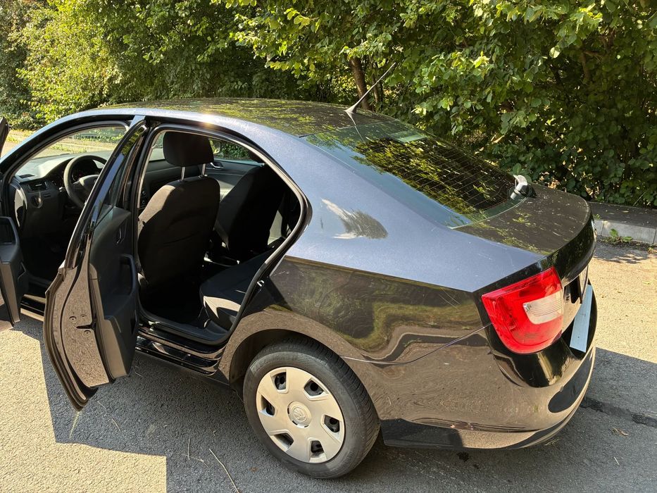 Skoda RAPID Climatronic | Scaune incalzite | Senzori parcare | Pilot automat