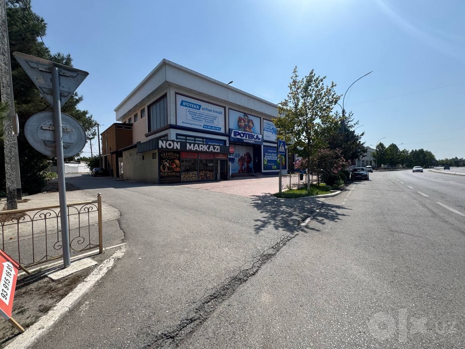 Sentr, tenisni kort va oybek yonida yulni buyiga 70m