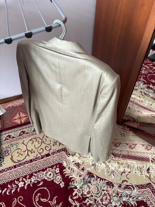 Пиджак новый светлый