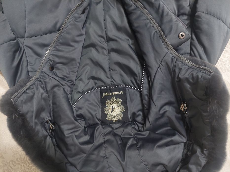 Продаю зимний пуховик