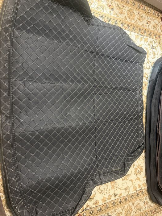 Полик в багажник Onix