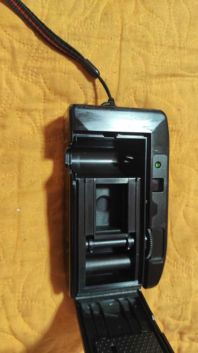 Фотоапарат с лента Skina