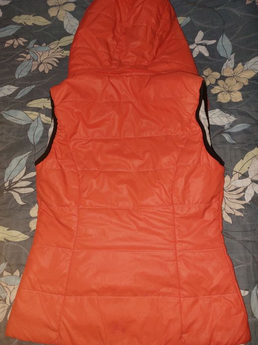 Жилетка в хорошем состоянии