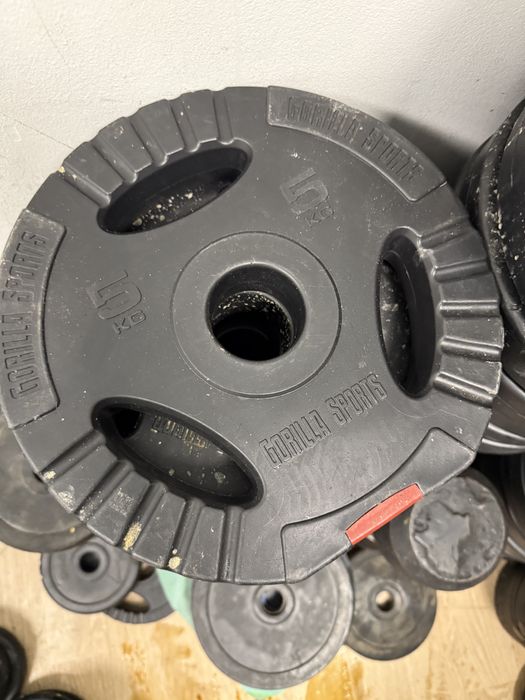 Discuri olimpice haltere si gantere 50 mm Olimpice noi pret 7 lei kg.