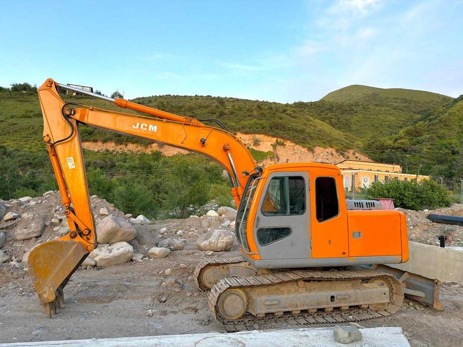 Экскаватор JCM 913  в рабочем состоянии  2007 г.