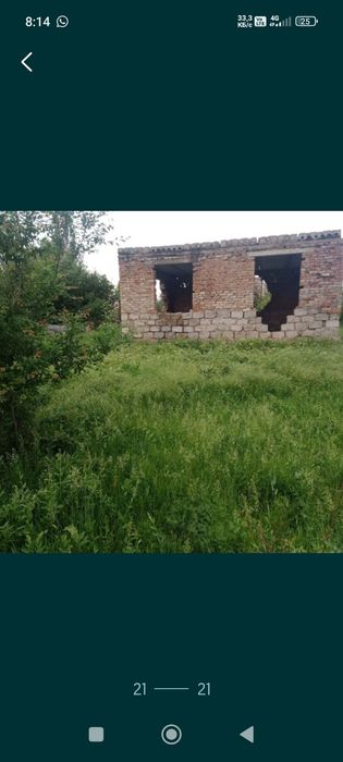 Участок с недостроенным домом
