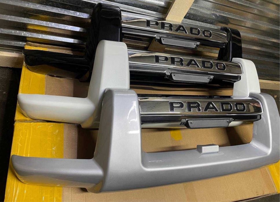 Губа на передний бампер Прадо 120 клык колпак на запасное колесо gx470