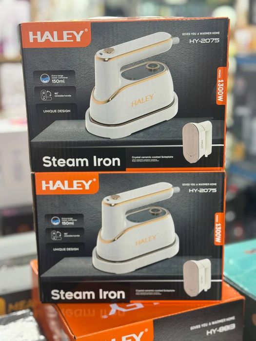 Паровой утюг//Ручной отпариватель для одежды