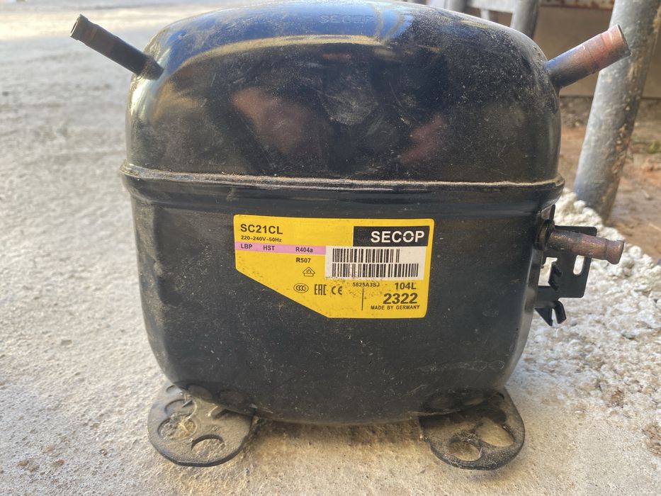 компрессор холодильника.